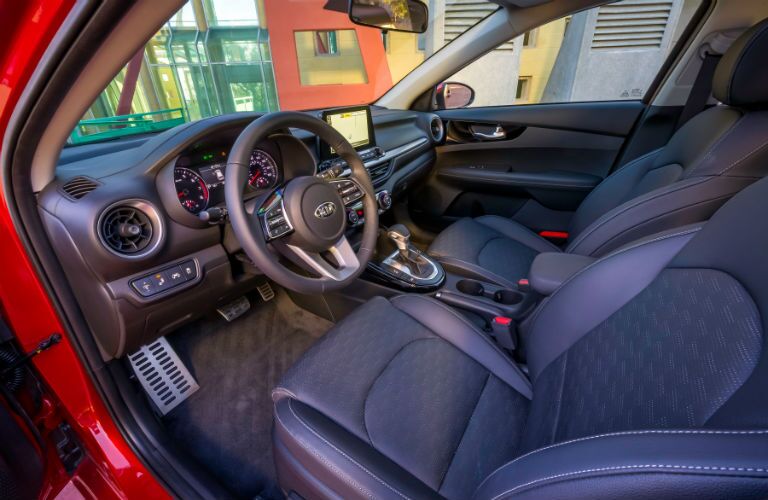 An interior photo of the driver's cockpit in the 2019 Kia Forte.