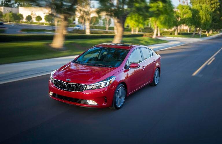 A front left quarter view of the 2018 Kia Forte sedan