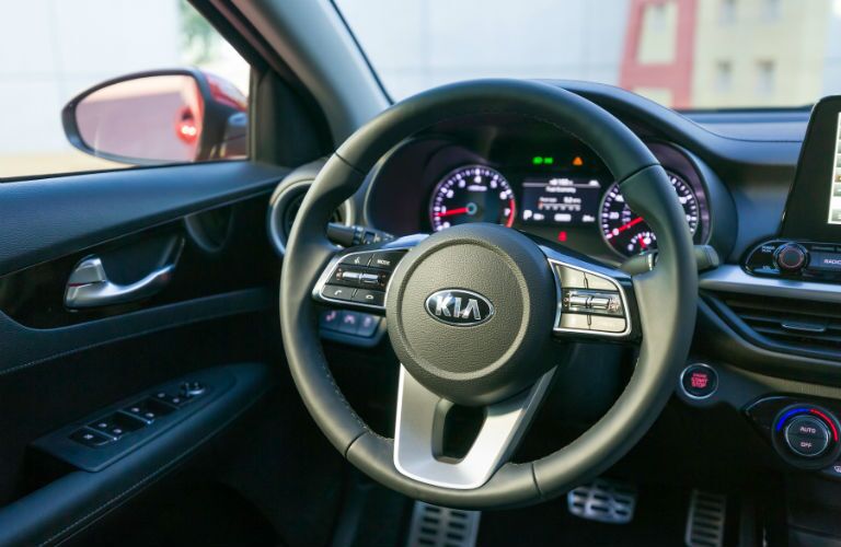 A photo of the driver's cockpit in the 2019 Kia Forte.
