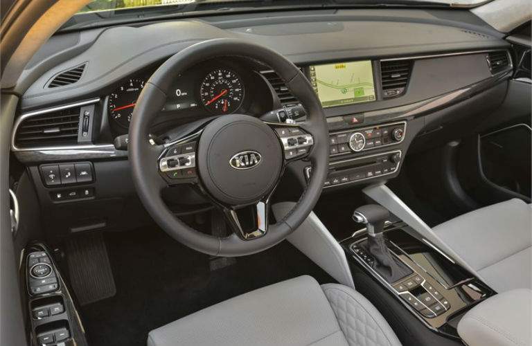 front interior of 2018 kia cadenza including steering wheel and infotainment system