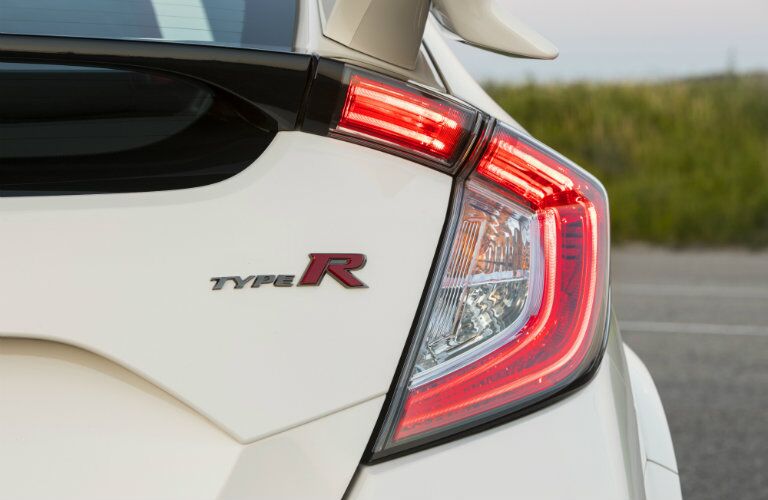 2019 Honda Civic Type R exterior rear closeup shot of unique taillight design, spoiler, and Type R badging