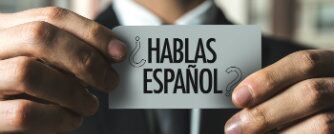 Do you speak spanish hablas espanol car held by a man in a suit