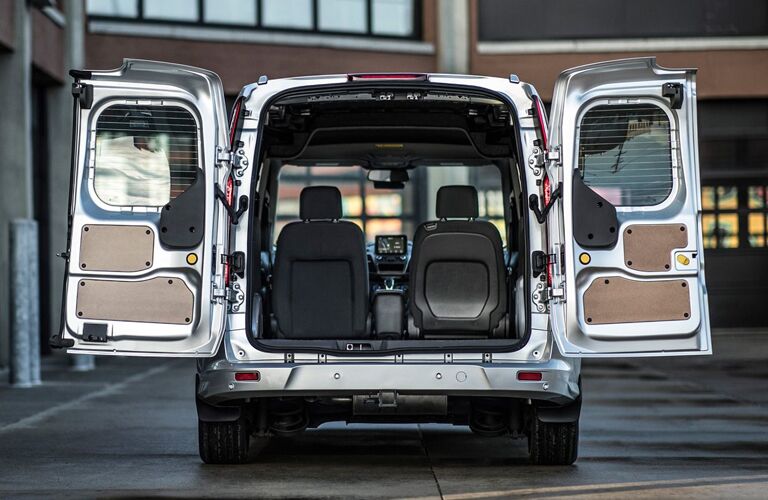 rear cargo space of 2019 ford transit connect van with rear doors open