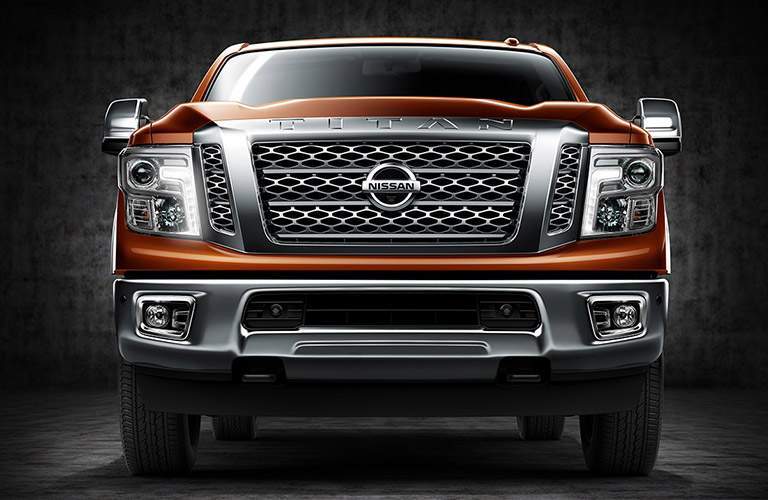 front grille of orange 2017 nissan titan xd