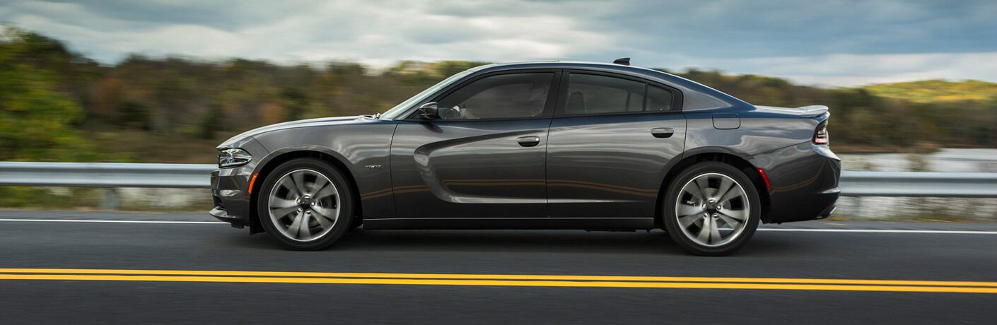 Driver's side exterior view of a gray Dodge Charger