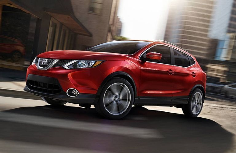 Exterior view of the front of a red 2019 Nissan Rogue Sport