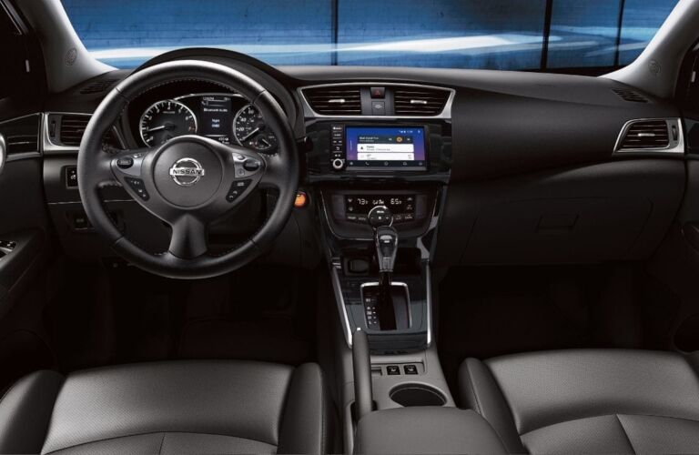 Interior view of the front seating area inside a 2019 Nissan Sentra