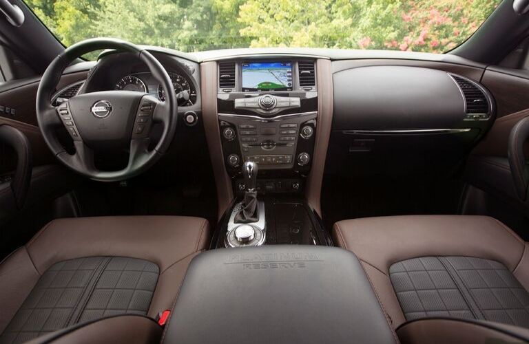 Interior view of the steering wheel and touchscreen inside a 2020 Nissan Armada