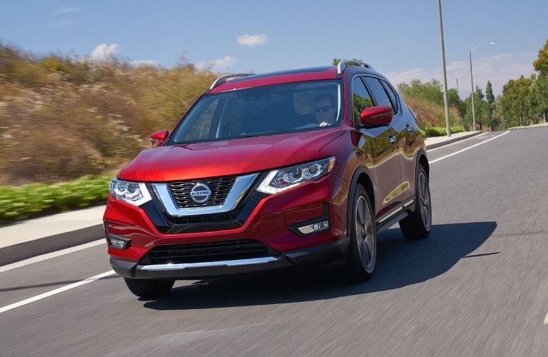 Exterior view of the front of a red 2020 Nissan Rogue