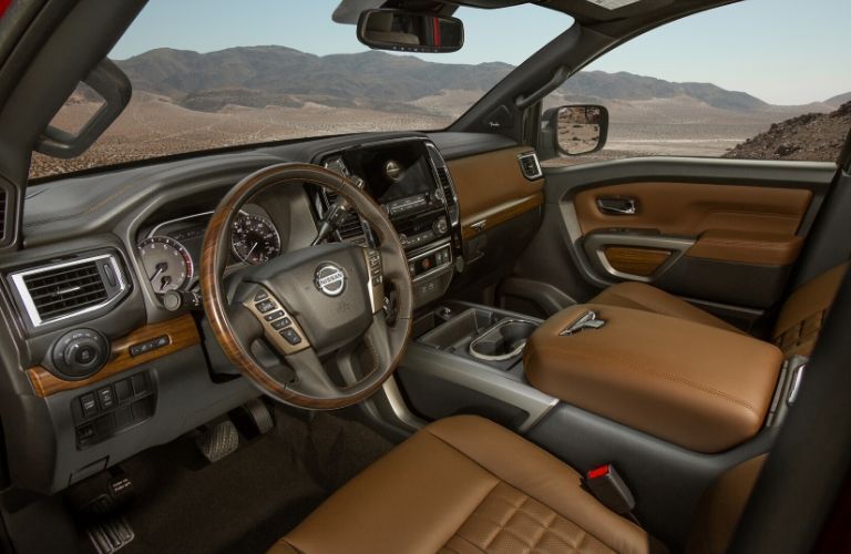 Interior view of the front seating area inside a 2020 Nissan TITAN