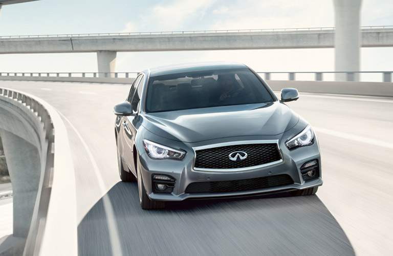 infiniti q50 driving on highway