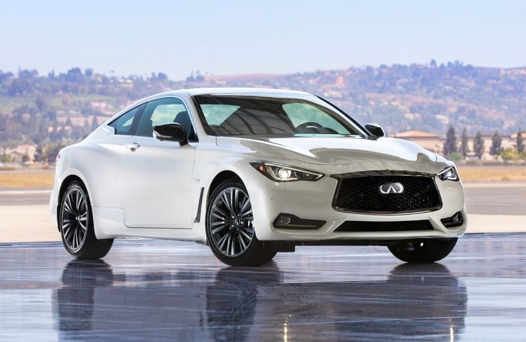 Exterior view of the front of a white 2020 INFINITI Q60