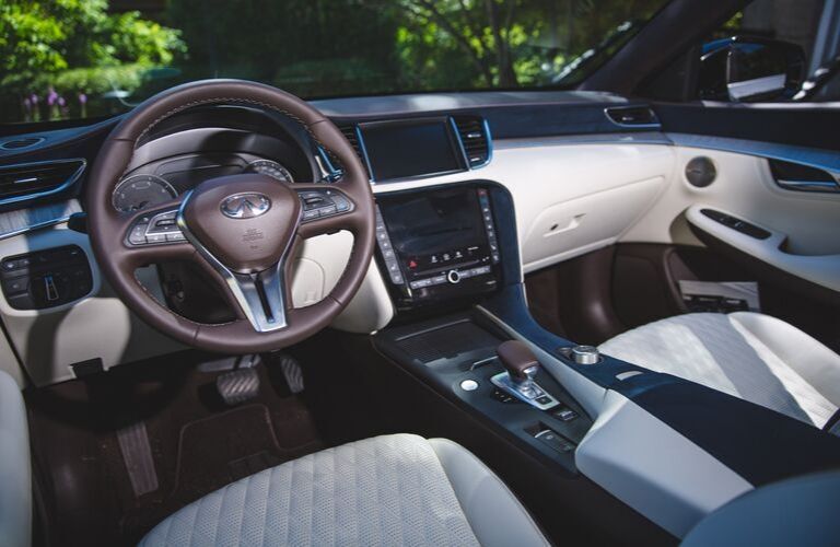Interior view of the front seating area inside a 2020 INFINITI QX50
