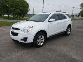 Front exterior view of a white Chevy Equinox