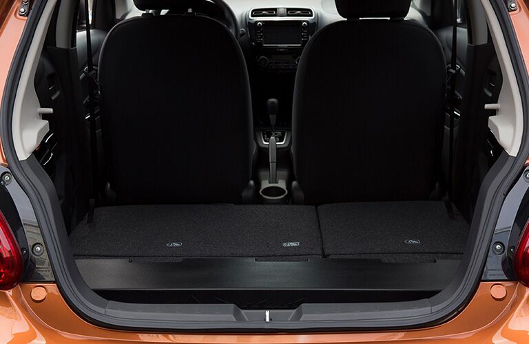 Cargo area of 2019 Mitsubishi Mirage with collapsed rear seats