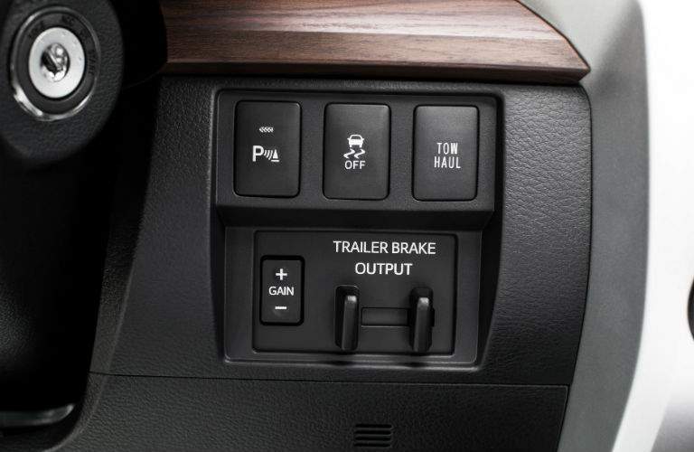 A close up photo of the trailer control system buttons for the 2018 Toyota Tundra