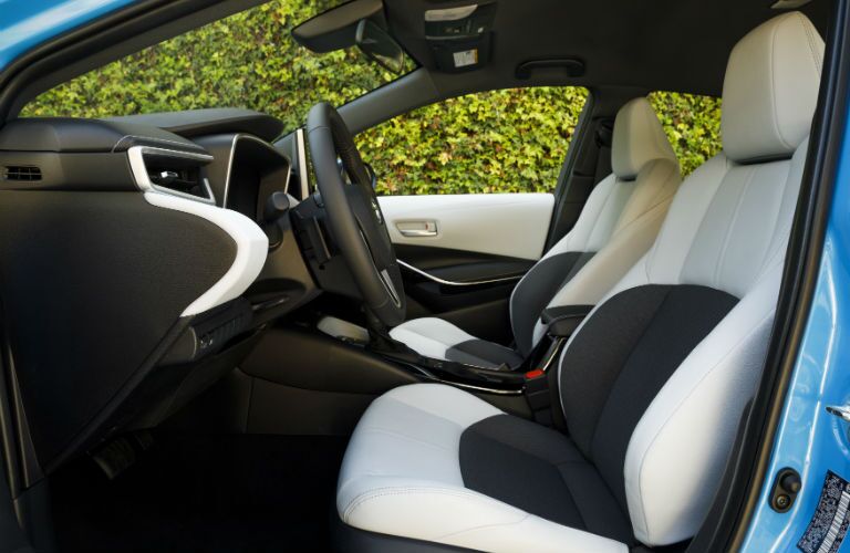A photo of the front seats in the 2019 Toyota Corolla Hatchback.