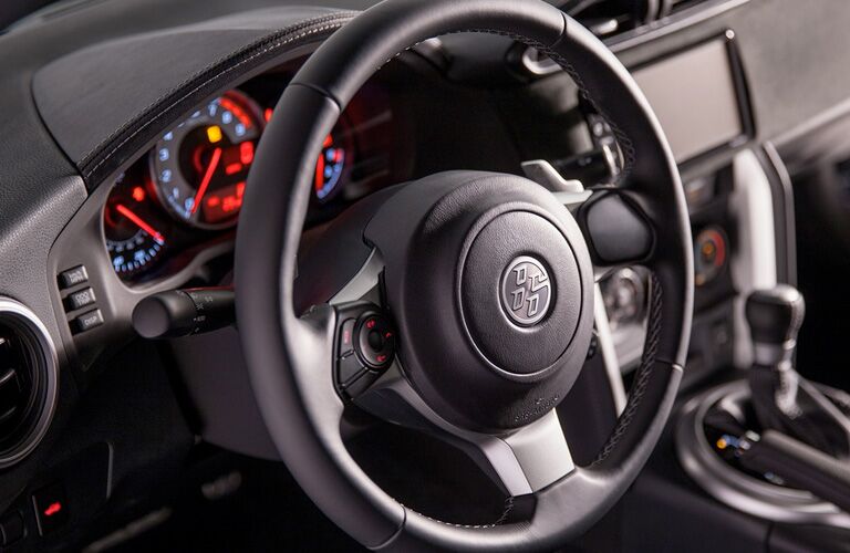 A tight photo of the steering wheel used for the 2018 Toyota 86.