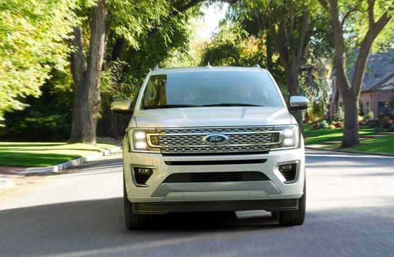 White 2019 Ford Expedition Front Grille and Exterior Driving on a Neighborhood Street