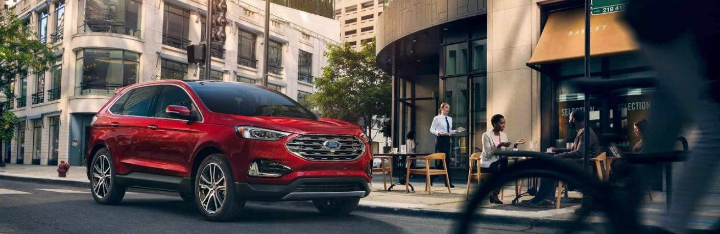 2019 Ford Edge Driving Near a Restaurant