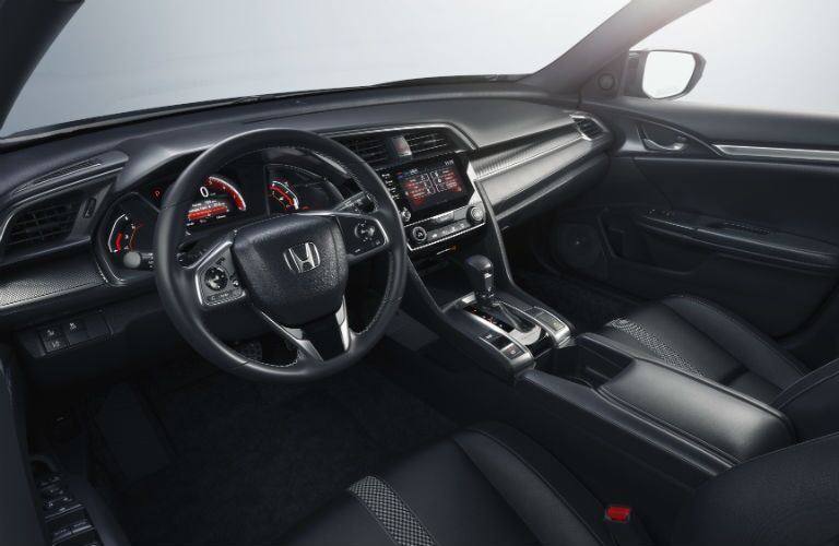 A photo of the front seats in the 2019 Honda Civic Sedan.