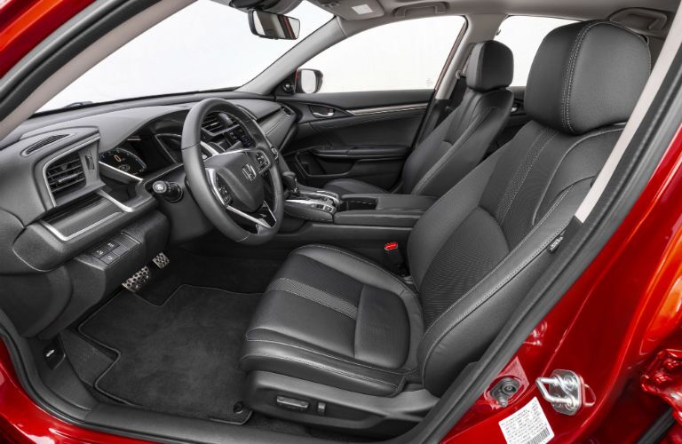 A photo of the front seats in the 2021 Honda Civic Sedan.