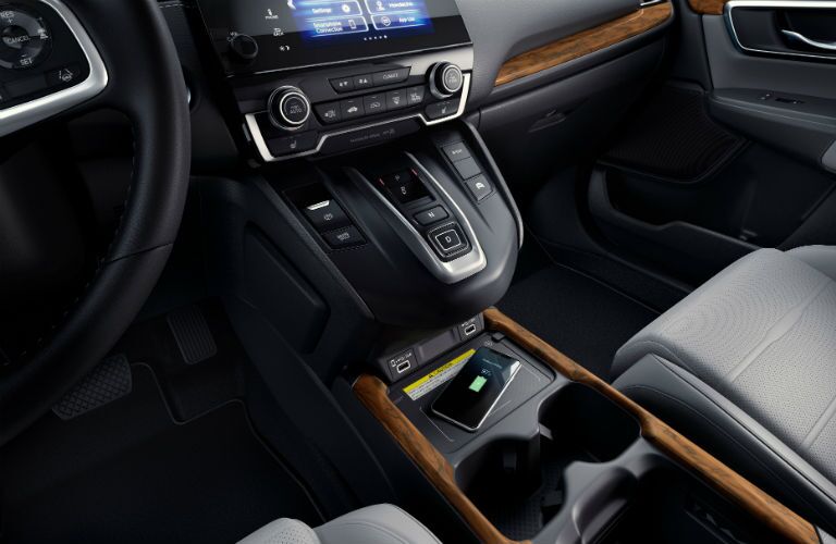A photo of the lower console in the 2020 Honda CR-V Hybrid.