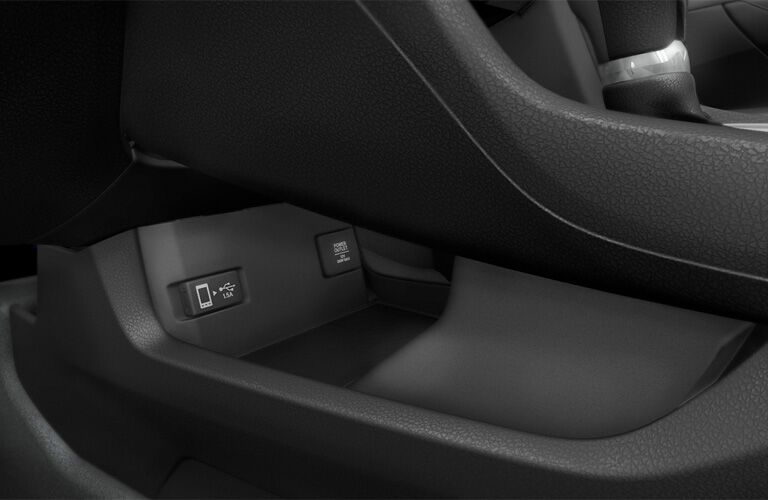 A photo of a storage tray in the 2019 Honda Civic Coupe.