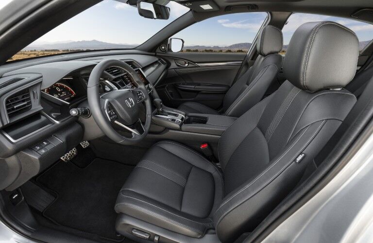 A photo of the front seats in the 2021 Honda Civic Hatchback.