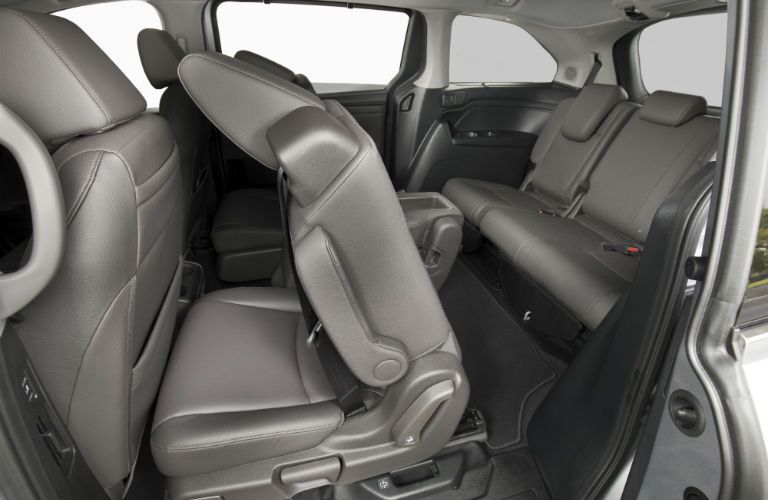 A photo of the second and third rows of seats in the 2020 Honda Odyssey.