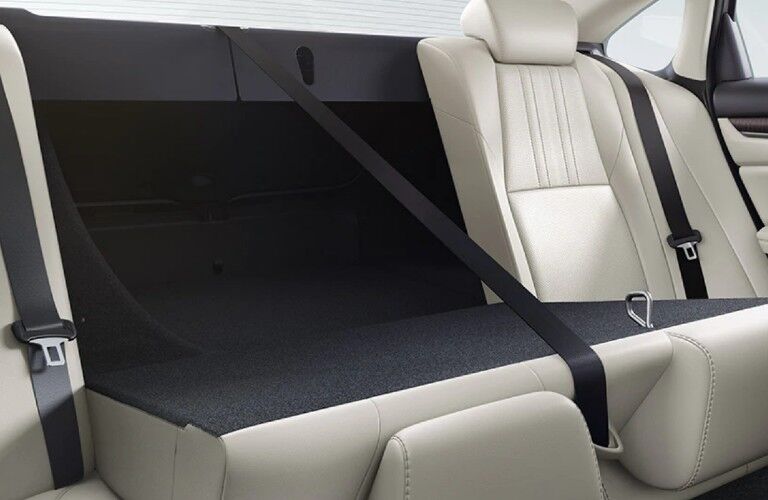 A photo of the backseat folded down in the 2021 Honda Accord.