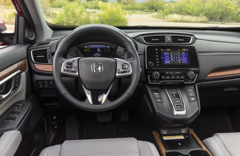 A photo of the driver's cockpit in the 2021 Honda CR-V Hybrid.