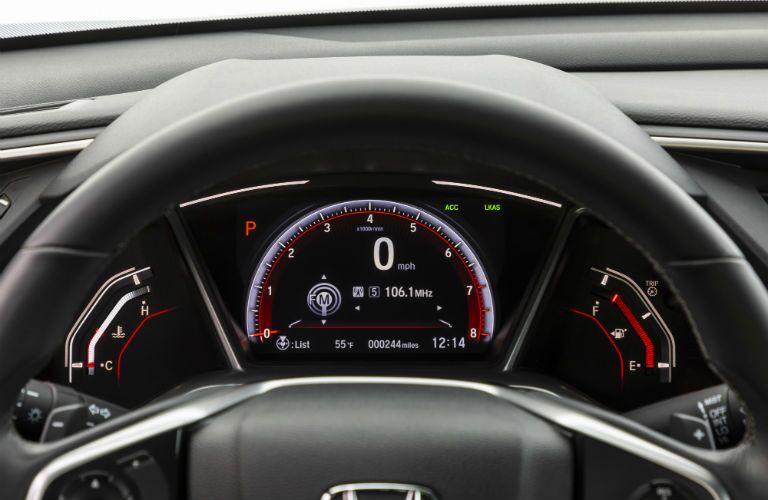 A photo of the center gauge cluster in the 2019 Honda Civic Coupe.