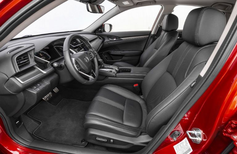 A photo of the front seats in the 2020 Honda Civic Sedan.