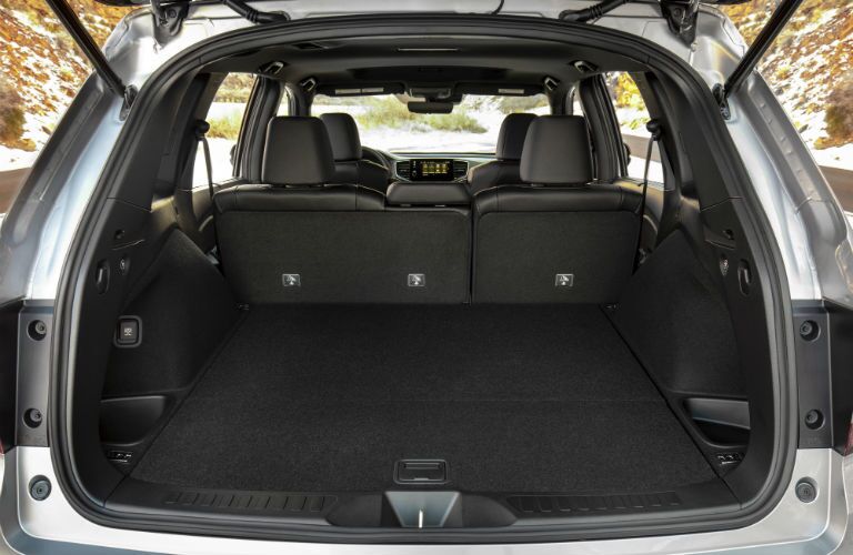 A photo of the cargo area in the rear of the 2021 Honda Passport.