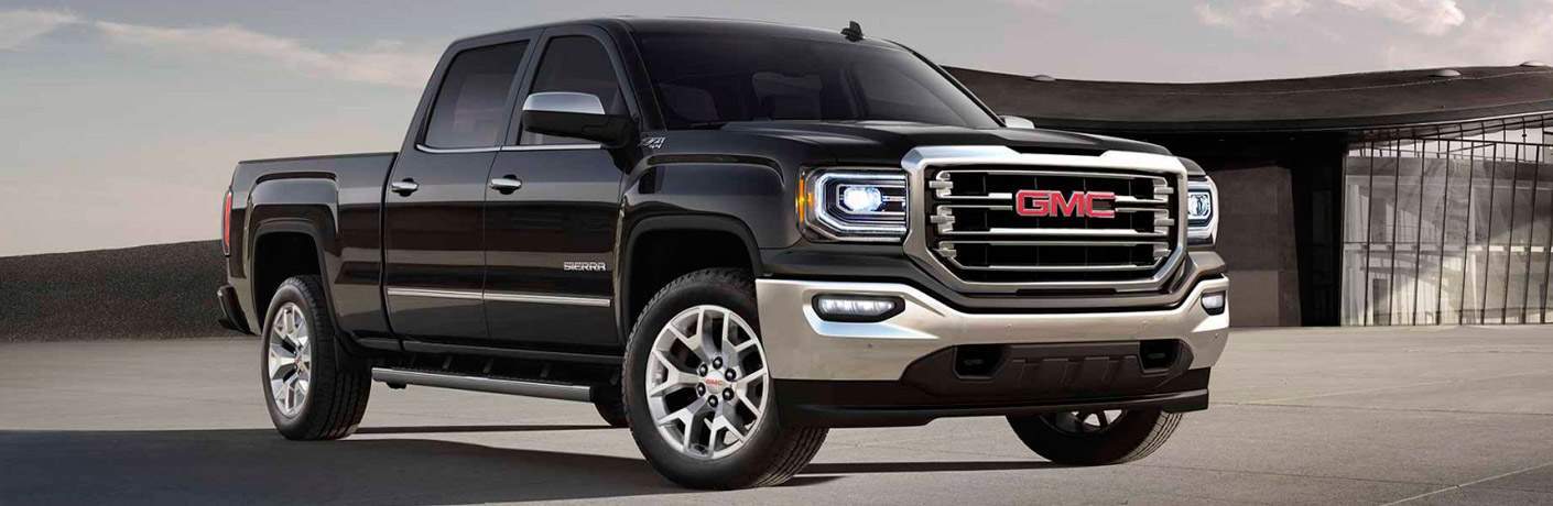 2017 GMC Sierra front right quarter view Billion Auto Group offers incentives on the truck for the month of October