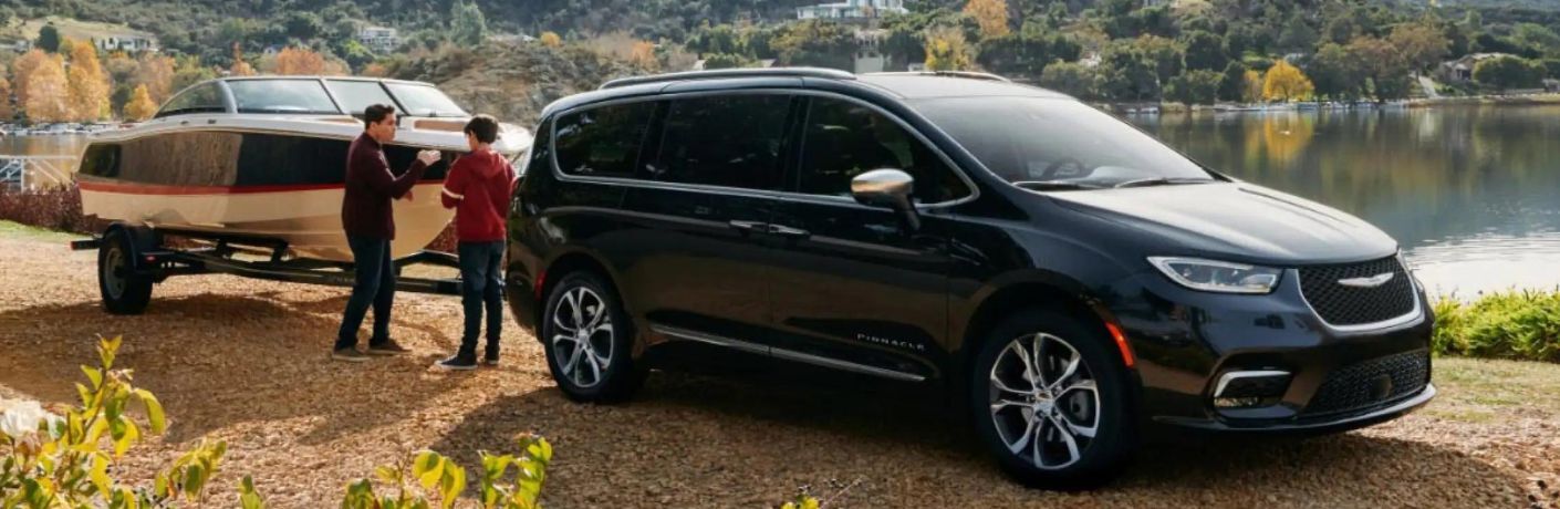 2023 Chrysler Pacifica towing a small boat