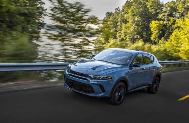 Side view of the 2024 Dodge Hornet on road