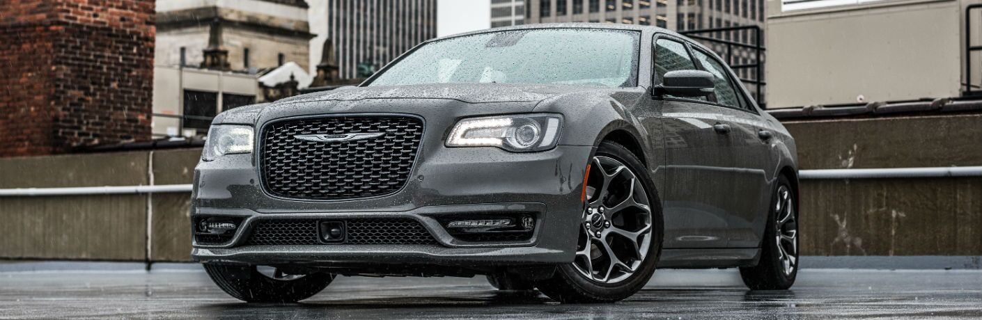 A front quarter photo of the 2018 Chrysler 300 parked on top of a building.
