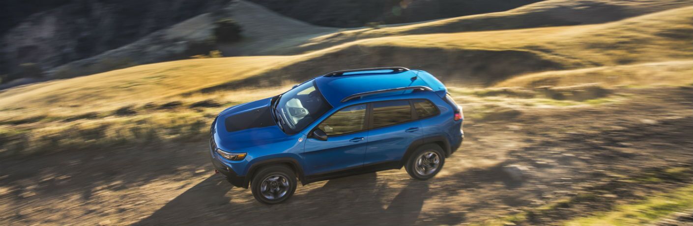 An overhead photo of the 2019 Jeep Cherokee Trailhawk driving over a trail.