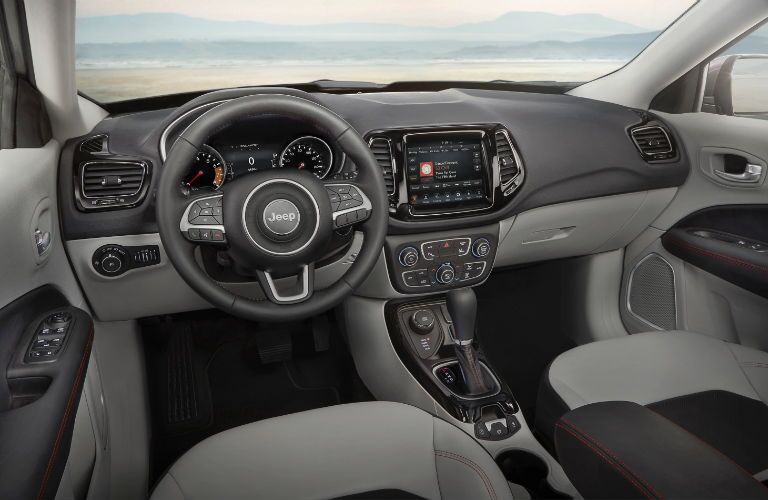 An interior photo of the dashboard in the 2019 Jeep Compass.