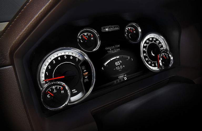A close up photo of the gauge cluster in the 2018 Ram 1500 showing the integrated trailer brake display