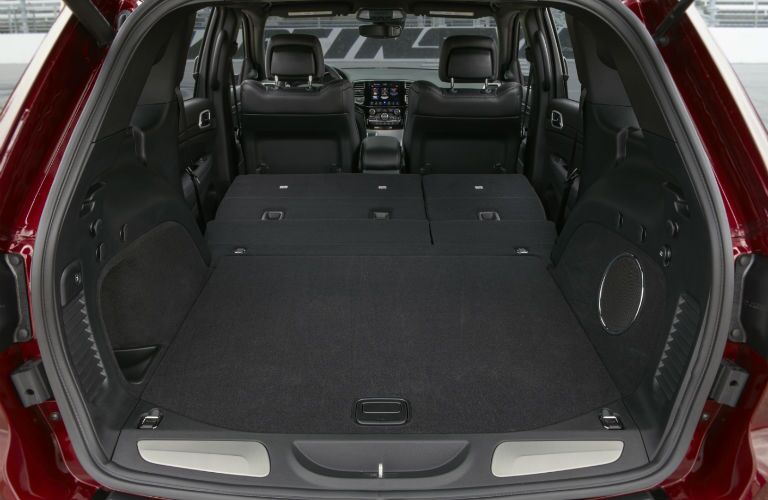 An interior photo of the maximum cargo configuration of the 2019 Grand Cherokee.