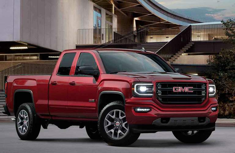 2017 GMC Sierra in Red shows off potential model during Billion Auto Group October sale