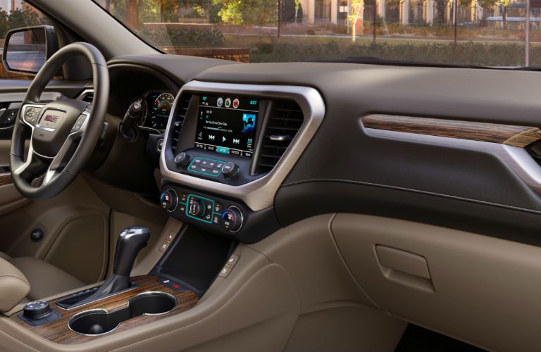 An interior photo of the dashboard in the 2018 GMC Acadia.