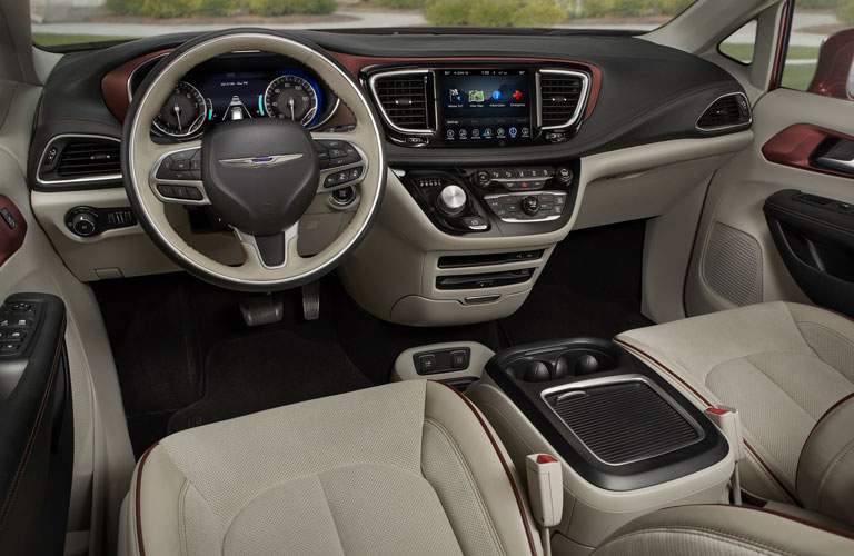 A photo of the dashboard of the 2018 Pacifica showing the new infotainment system which is now compatible with smartphone applications