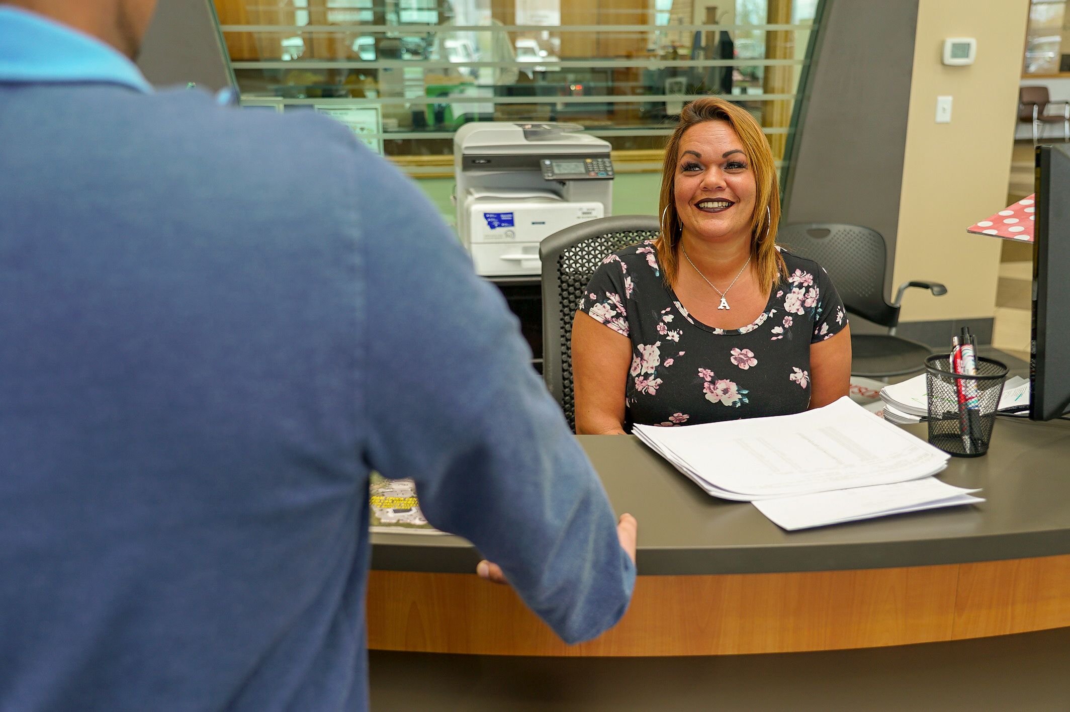 A photo of our front desk receptionist.