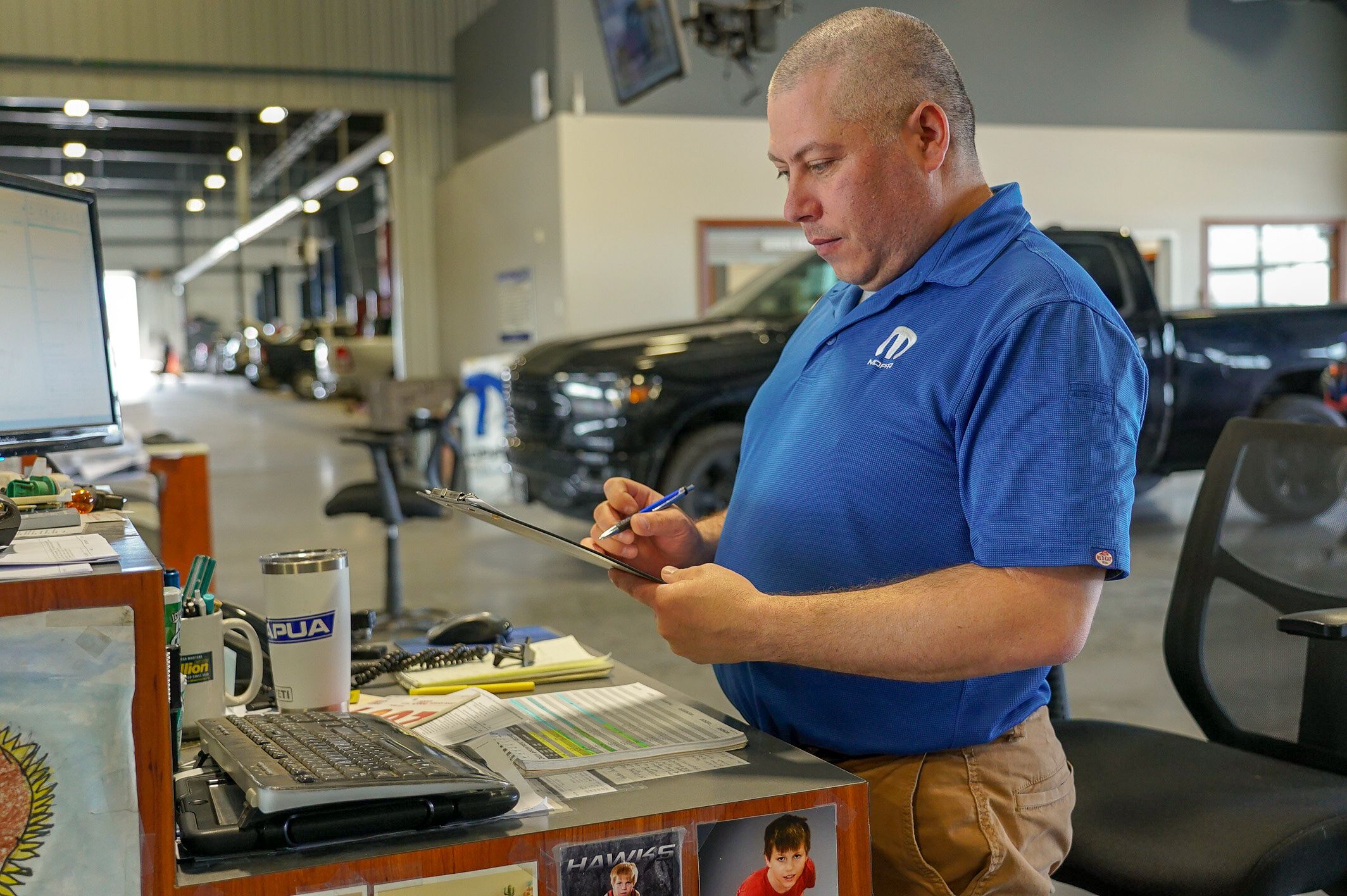 A photo of a service advisor on our service drive.