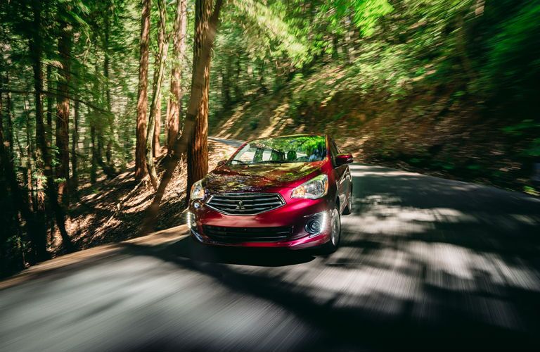 2018 Mitsubishi Mirage G4 driving through a wooded area
