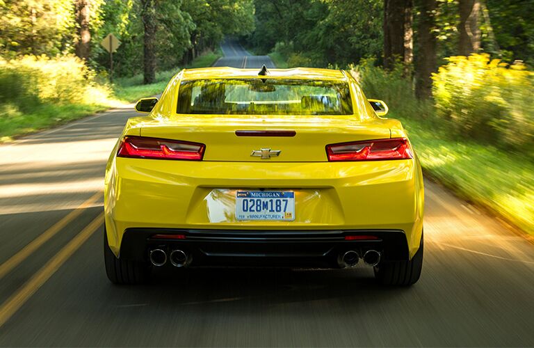 Rear view of a 2018 Chevy Camaro as it drives away.